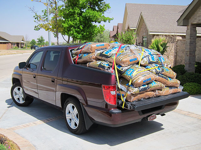 Photo of Honda Ridgeline loaded with 40 bags of mulch