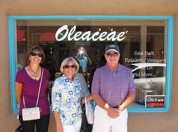 Photo of tourists in front of store