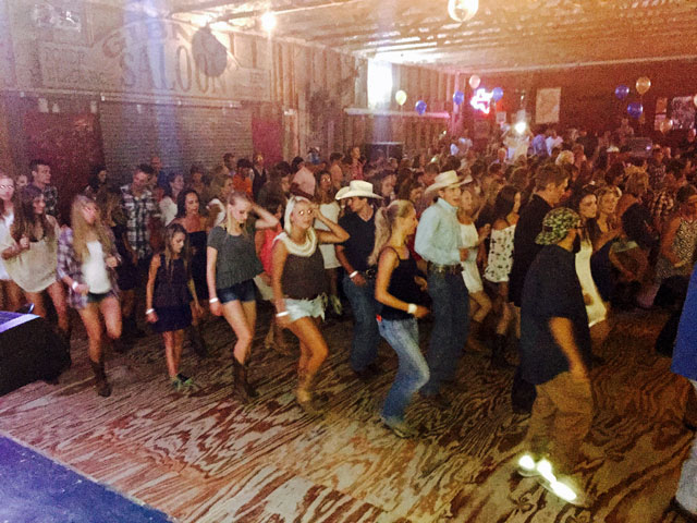 Line dancers pack the floor at Mercer Street Dance Hall