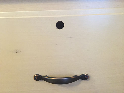 Hole drilled in drawer