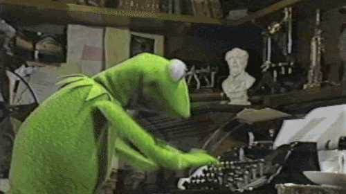 GIF of Kermit the Frog typing furiously