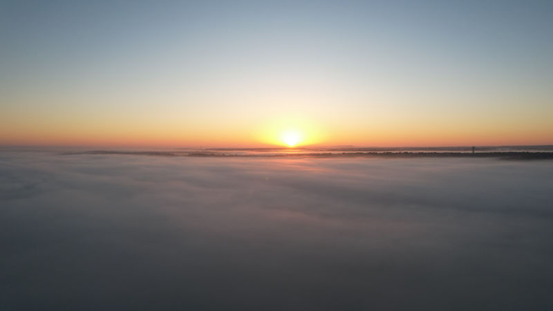 Photo: Drone capture of sunrise over a foggy Horseshoe Bay, TX