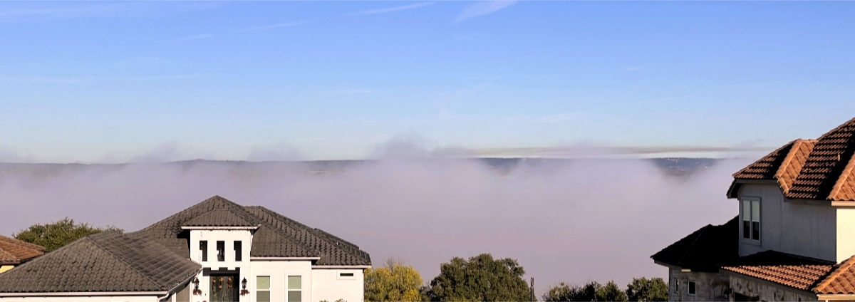 Photo: Highly localized fog bank resting over Lake Marble Falls (TX) and viewed from the parking lot of First Baptist Church, Marble Falls