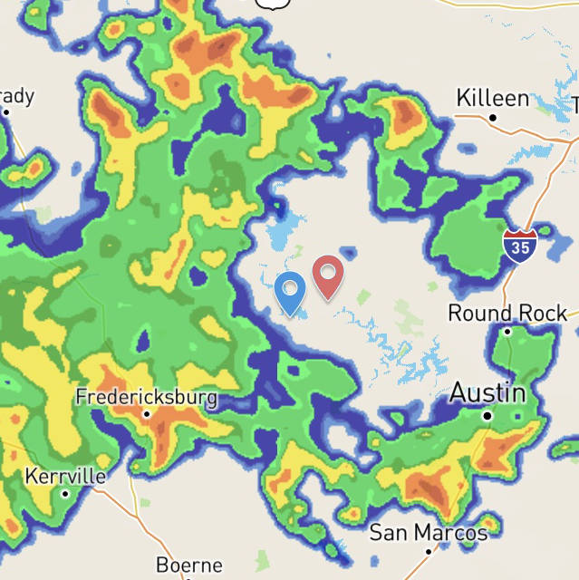 Screen capture of weather radar showing a circle of storms surrounding, but not over, Horseshoe Bay, Texas