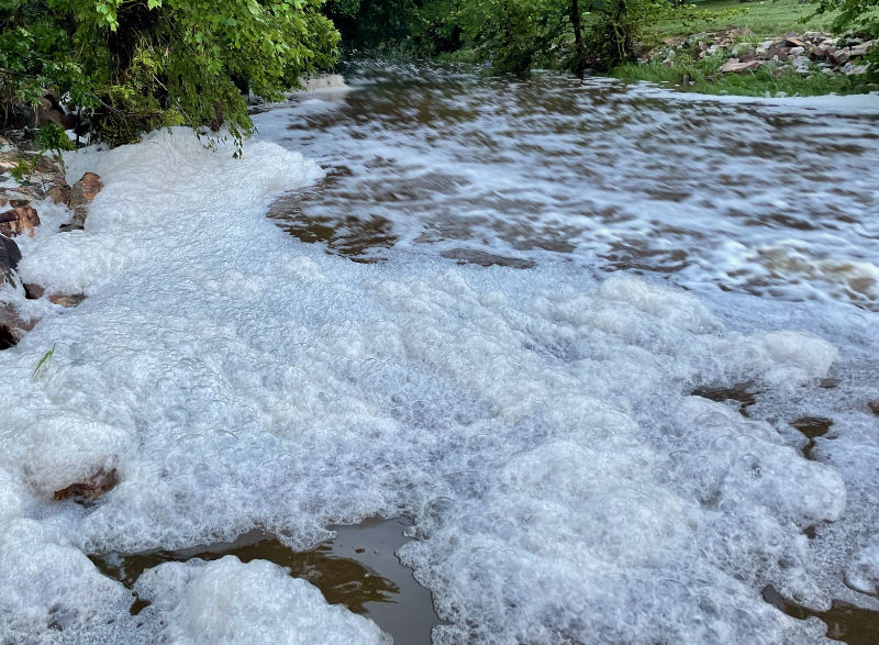 Photo: foam in creek following torrential rain, Horseshoe Bay, TX