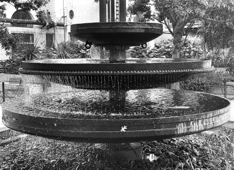 B&W photo: fountain in the plaza at the Pearl District, San Antonio, TX