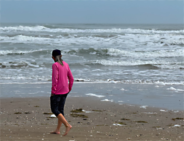 Photo: my wife looking for shells on the beach at South Padre Island, TX