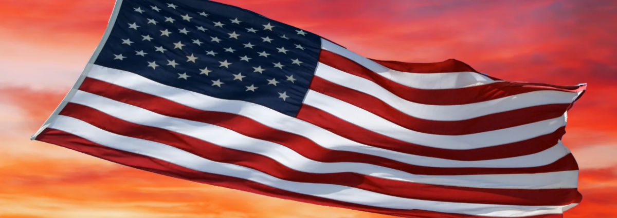 Illustration: American flag waving against a colorful sky
