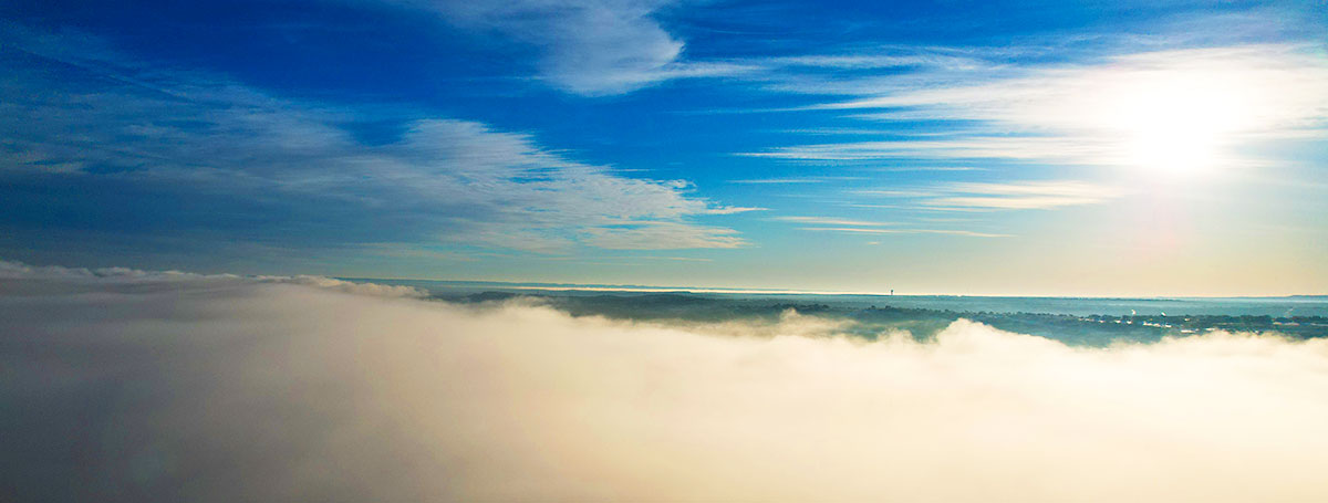 Photo: aerial photo, via drone, of sunrising over a fog bank in Horseshoe Bay, Texas