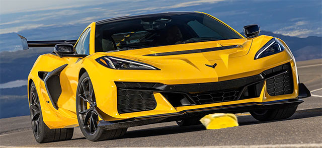 Fake photo showing a yellow C8 Corvette with a flattened plastic bucket under the front bumper